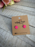 Small, Flower-shaped pink earrings by Village Made Earringa